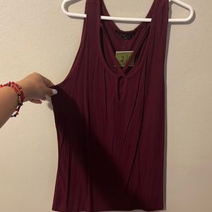 Brand new tank top with tag. Size medium